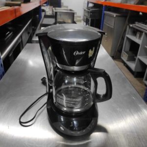 Cafetera Oster BVSTDCDWX20 automática negra de filtro 110V Cod: I0359